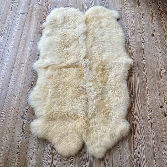 Schaffell Teppich Naturweiß 200x110cm | 4rer | Hochwertiger Fellteppich - FellHaus
