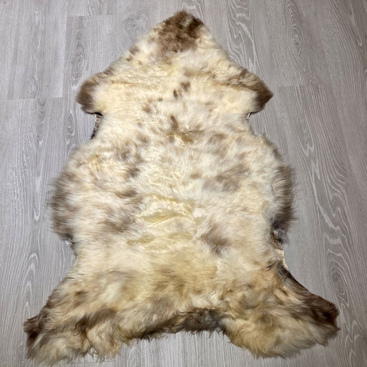 Schaffelll Hundedecke naturweiß braun  gefleckt