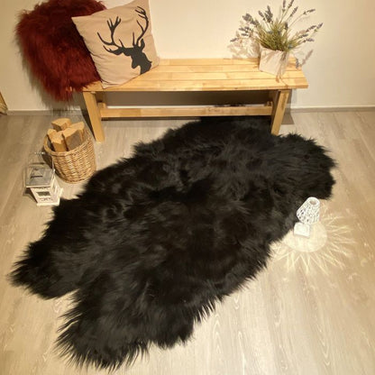Island Schaffell Teppich aus 4 Fellen schwarz