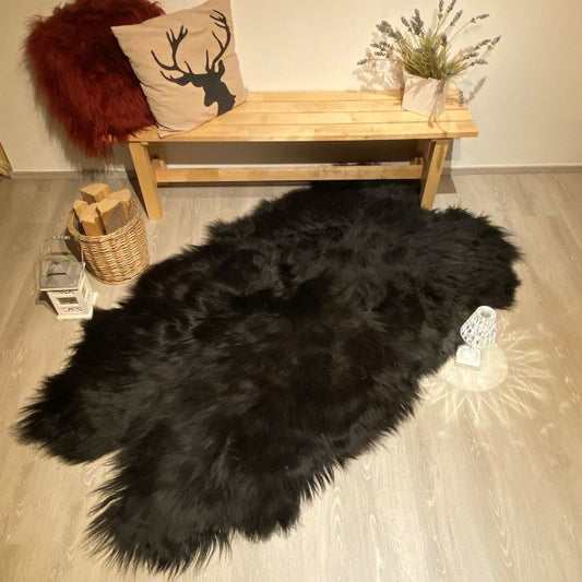 Island Schaffell Teppich aus 4 Fellen schwarz